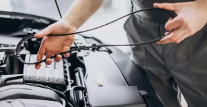 repair man making car service