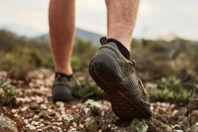 cropped shot of an unidentifiable young hikers fee